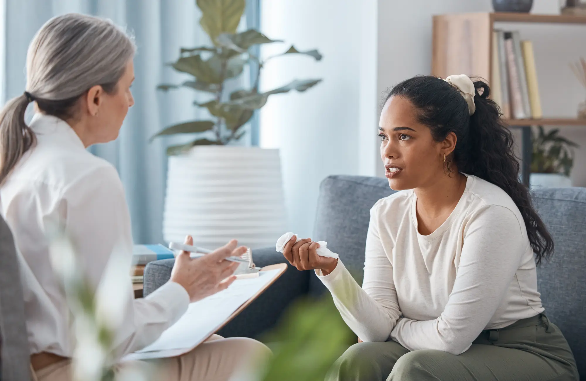 Young female with doctor while on PTSD & Trauma Therapy at Transformation Health Services in Virginia Beach, VA