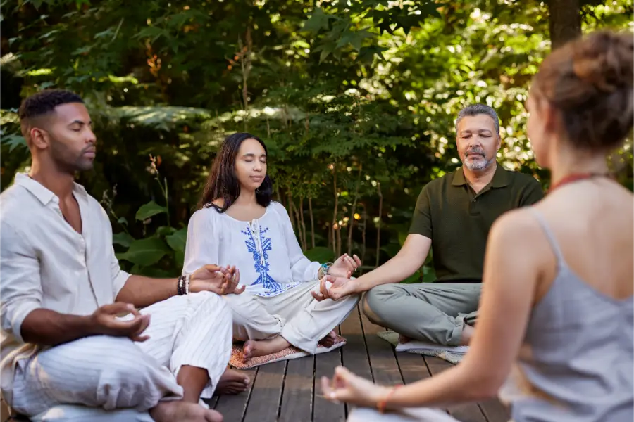 Group of people meditating while Half-Day Healing Intensives & Retreats at Transformation Health Services in Virginia Beach, VA