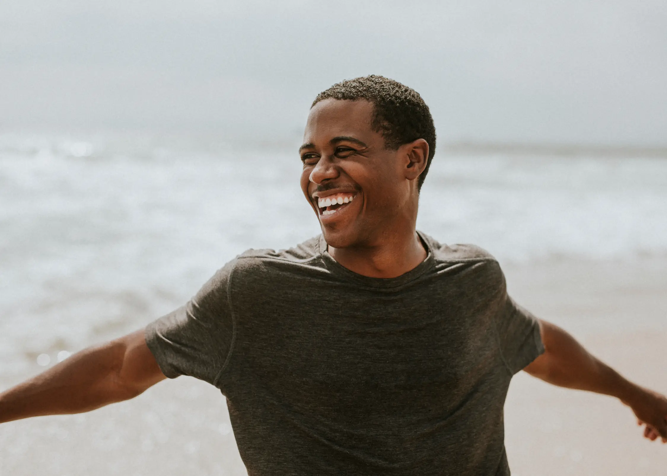 Man smiling and happy with Solution-Focused Brief Therapy (SFBT) at Transformation Health Services in Virginia Beach, VA
