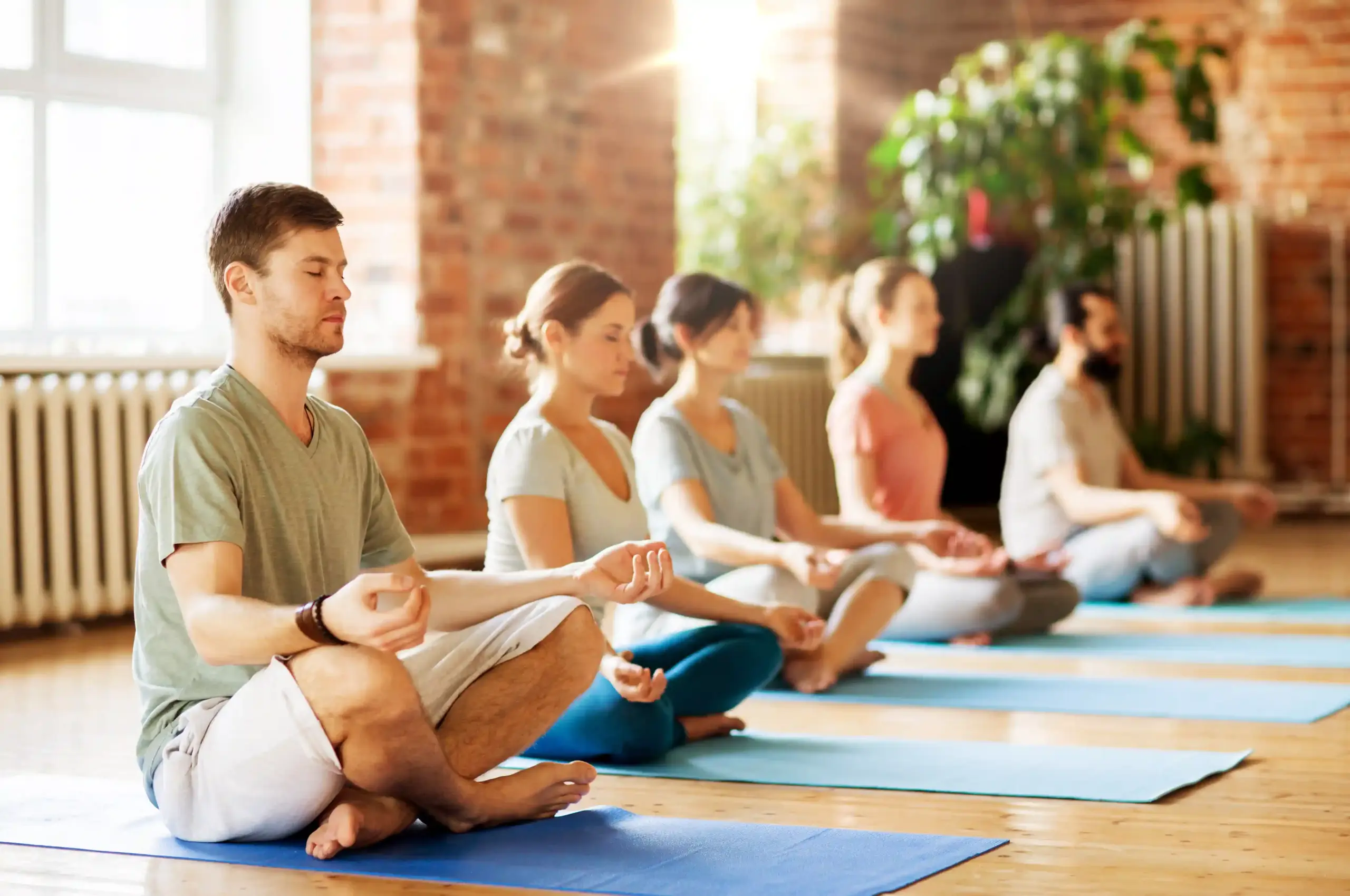 Group of people doing meditation while Specialized Healing Modalities at Transformation Health Services in Virginia Beach, VA